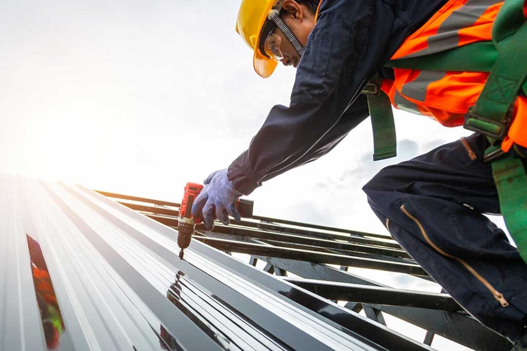 A homeowner reviews a detailed roofing estimate with a contractor beside a residential roof inspection.