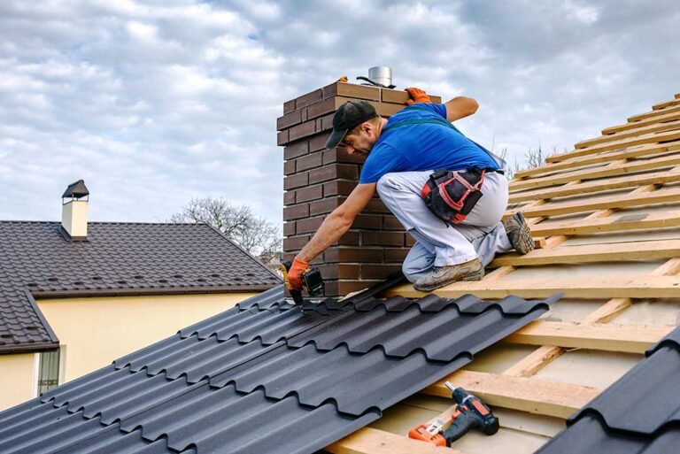 A homeowner checks gutters and roof edges from the ground before leaving for vacation.
